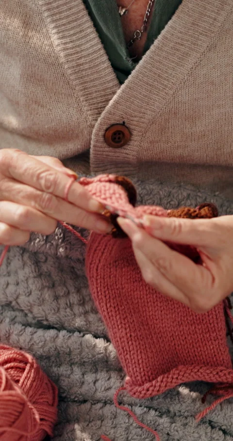 Hands, home and knitting with elderly woman, hobby and relax with retirement 스톡 동영상 308995444