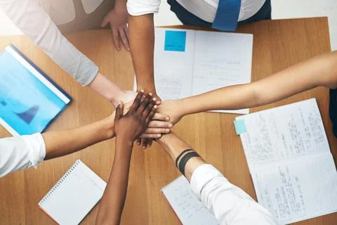 Hands, huddle and group in office with teamwork for unity with goal in work with Stock Photos