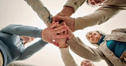 Hands, huddle and people in circle together for solidarity, teamwork or uni.. Stock Photos