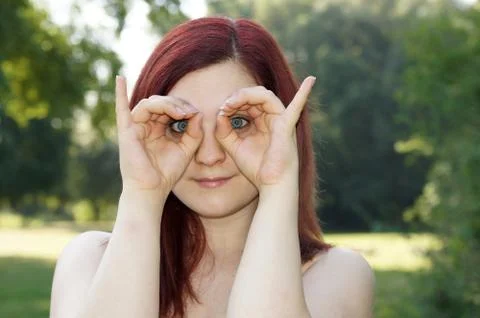 Hands imitating binoculars Stock Photos