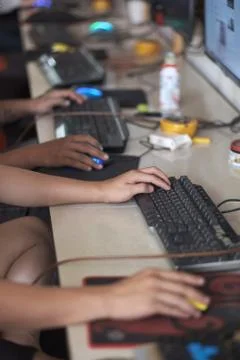 The hands of information technology professionals on keyboards and mice of co Stock Photos