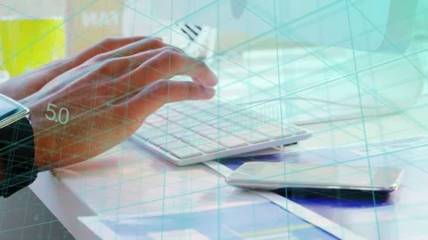Hands initiating key presses, typing and shifting on keyboard while updating Stock Footage 335761654