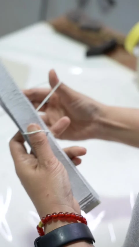 Hands Inspect Flexible Material Component in Footwear Factory Vertical Stock Footage 340182370