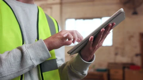 Hands, inspection and man with tablet in carpentry warehouse for building or Video stock 338044529