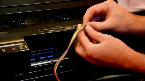 Hands Installing Ink Tubes in Large-Format Printer System Video stock 320669808