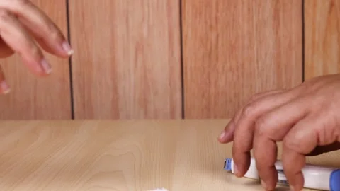 Hands Interacting with Desk Items Stock Footage 303948498