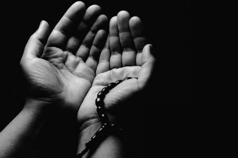 Hands up, islamic praying Stock Photos
