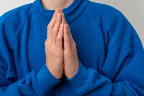 Hands joining in a prayer or Namaste gesture, bringing a sense of spiritual.. Stock-Fotos