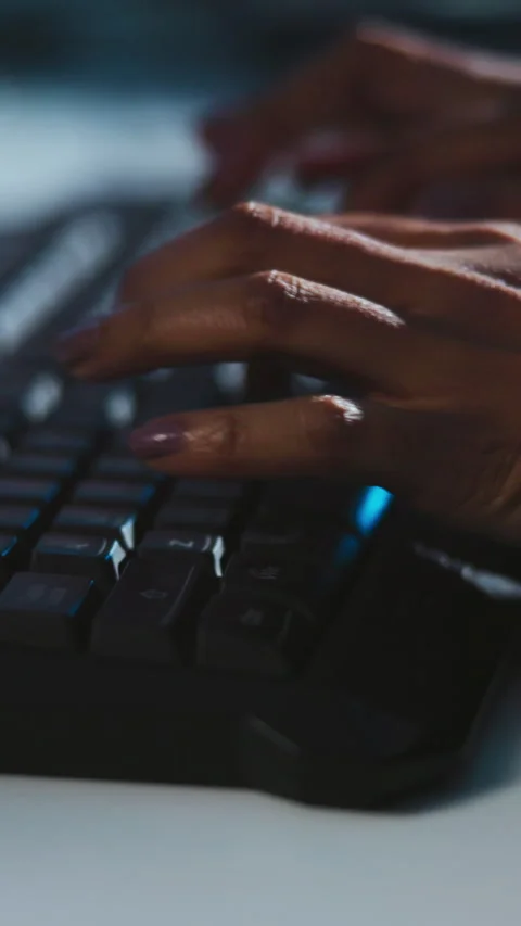 Hands, keyboard and typing at night for coding, web development or programming Stock Footage 333673198