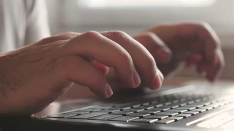 Hands on keyboard. Freelancer busy worker working with modern laptop device Stock Footage 148448170