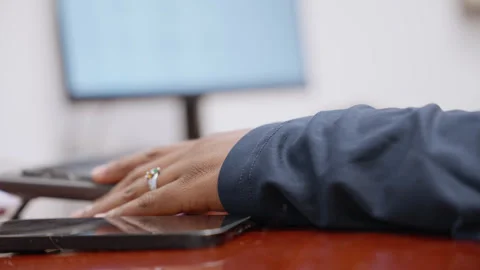 Hands on Keyboard Next to Smartphone Stock Footage 327358274