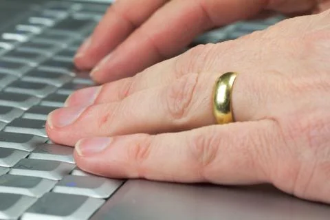 Hands on a keyboard Stock Photos