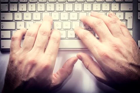 Hands on keyboard Stock Photos