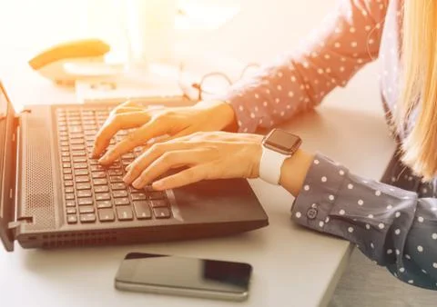 Hands on the keyboard at sunset Foto stock