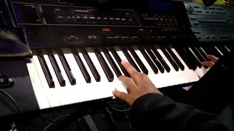 Hands on the keyboard-tilt up to stage Stock Footage 10790541