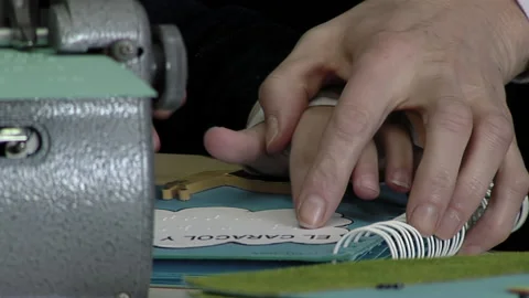 Hands of a Kid Learning Braille Code While Reading the Word "The Snail". Stock Footage 220737543
