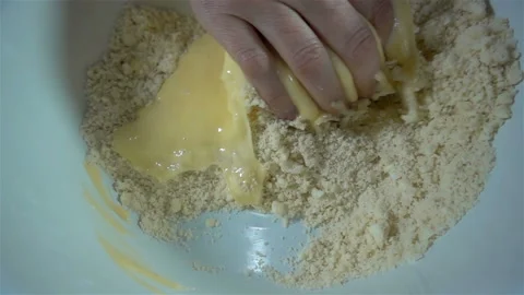 Hands knead baking dough in slow motion Stock Footage 132249145