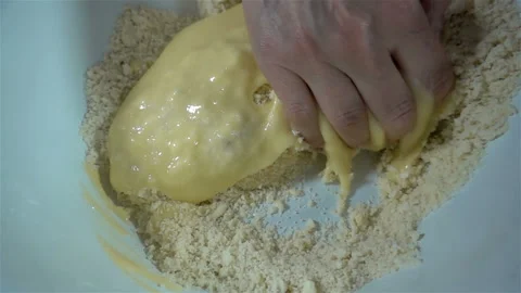 Hands knead baking dough in slow motion Video stock 137790103