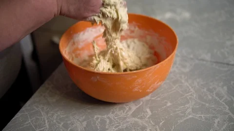 Hands knead the dough Stock Footage 120292969