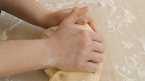 Hands kneading bread in table Stock-Footage 37819064