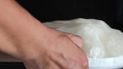 Hands Kneading Dough In Bowl For Baking Bread Vídeos de archivo 343369794