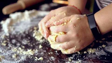 Hands Kneading Dough In Flour On A Table Stock Footage 114665512
