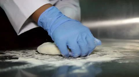 Hands Kneading Dough Stock-Footage 65722239