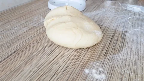 Hands kneading dough Stock Footage 126325115