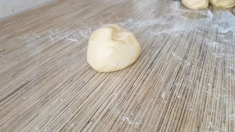 Hands kneading dough Stock Footage 126325414