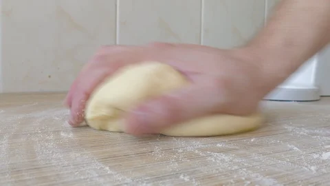 Hands kneading dough Stock Footage 126325465