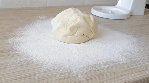 Hands kneading dough Stock Footage 126327424