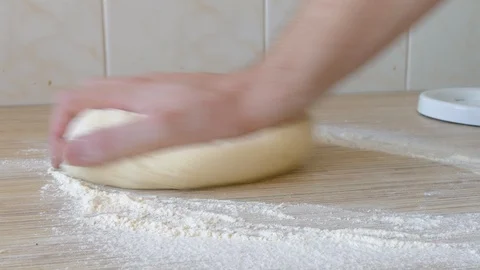 Hands kneading dough Stock Footage 126327600