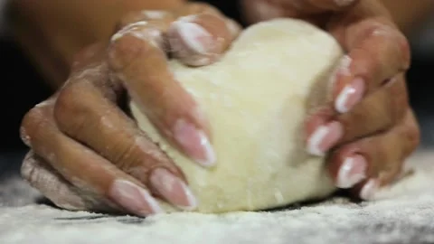 Hands kneading dough Stock Footage 172486317