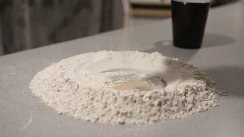 Hands kneading dough on table Video stock 132844085