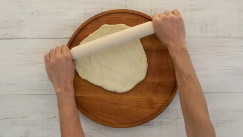 Hands kneads the dough for home baking chef, pastry. Stock Footage 141429239