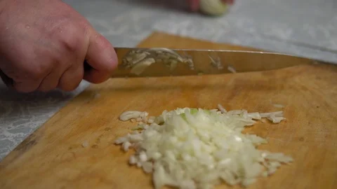 Hands with a knife cut onions Stock Footage 120294753