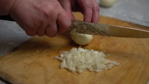 Hands with a knife cut onions Stock Footage 122762133