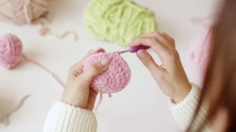 Hands knit with crochet hook and woolen threads Stock Footage 213302804