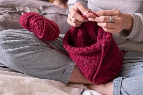 Hands knitting sweeter with needles close up 스톡 사진