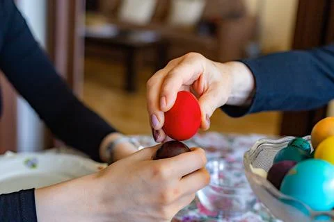 Hands Knocking Eggs. Stock Photos