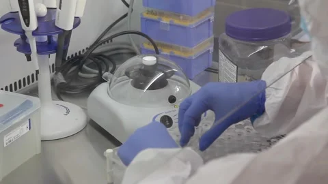 Hands of a laboratory assistant. test tubes, syringes, Video stock 141883860