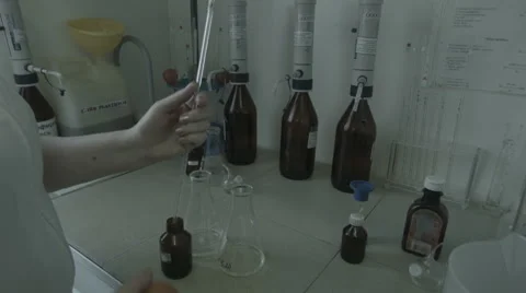 Hands of a laboratory experiment Stock Footage 42754148