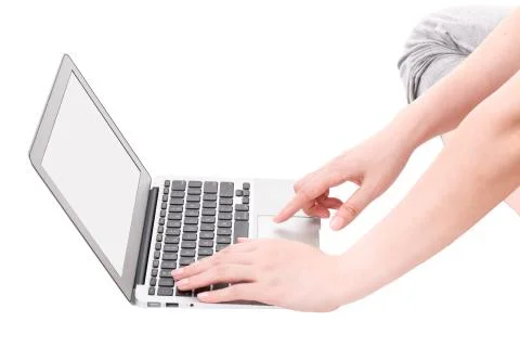 Hands on the laptop computer isolated on white. Stock Photos