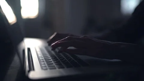 Hands on laptop computer keyboard typing text and using touchpad Stock Footage 75214285