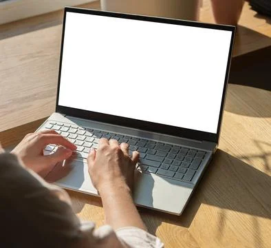Hands at laptop with screen mockup, empty blank clean display mock upp Stock Photos