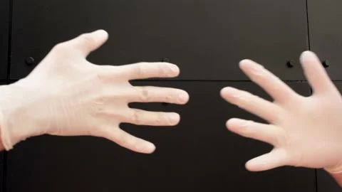 Hands in latex gloves Say Hello with a Fist (closed hands) Bump during corona Stock-Footage 137984175