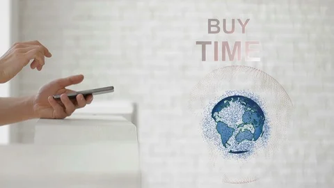 Hands launch the Earth's hologram and Buy time text Stock Footage 89146445