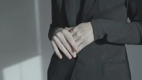 Hands at the level of the abdomen during a conversation. Minor finger movements. Stock Footage 233009728