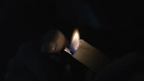 Hands light a candle Stock Footage 93006314