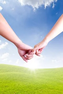 Hands linking fingers Stock Photos